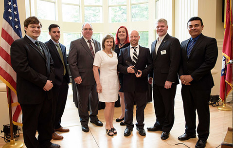 Governor's Award for Excellence in Global Trade (Left to right) Phillip Schoeman, Internal IT Specialist; Tyler Carroll, Implementation Specialist; Mark Bowden, Research & Development Manager; Donna Henderson, Project Administrator; Kathy Barbeire-Bruton, Marketing Manager; Vernon Smith, CEO; William Burgess, Chairman, ArDEC; Artistides Urdaneta, Sr. Software Engineer